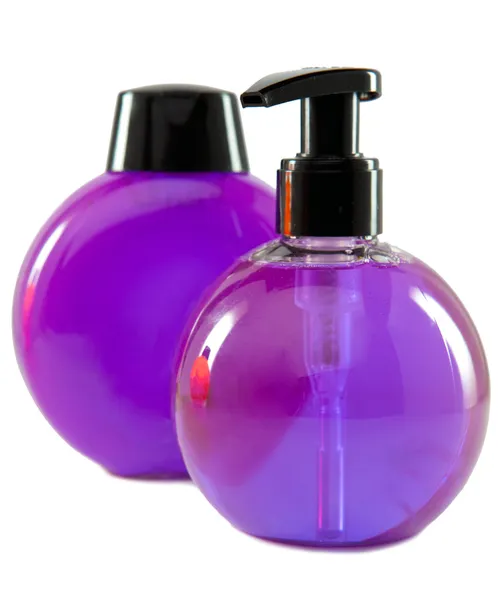 Botellas pequeñas cosméticas de color brillante con el dispensador —  Fotos de Stock