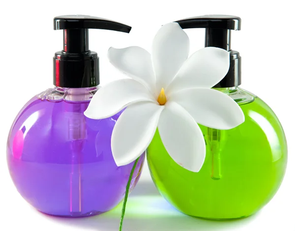 Světlé barvy kosmetické lahvičky s dávkovač — Stock fotografie