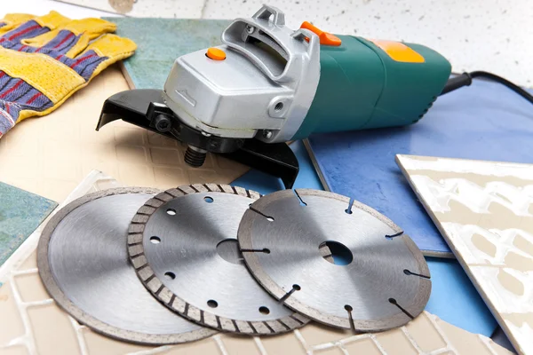The cutting machine and various detachable disks — Stock Photo, Image