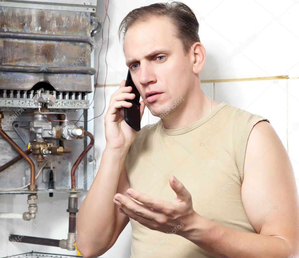The man calls by phone to cause the repairman of gas water heaters