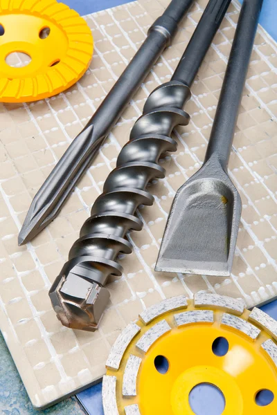 The tool - Nozzle for the puncher and a grinding disk — Stock Photo, Image
