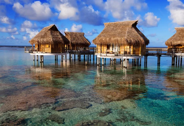 Houses over the transparent quiet sea water — Stock Photo, Image