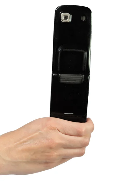 The hand holds the black cell phone — Stock Photo, Image