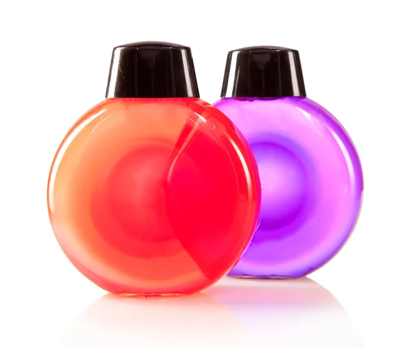 Two bright color cosmetic small bottles — Stock Photo, Image