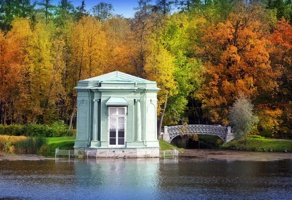 Ancient pavilion and the bridge in palace park. Gatchina. Petersburg. Russia — Stock Photo, Image