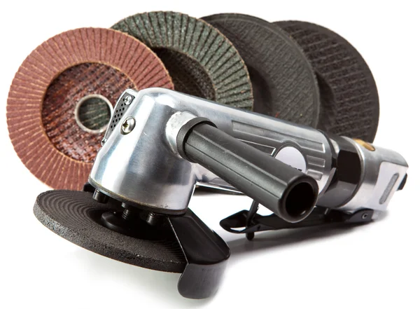 Air angle grinder and different grinding wheels on white background — Zdjęcie stockowe