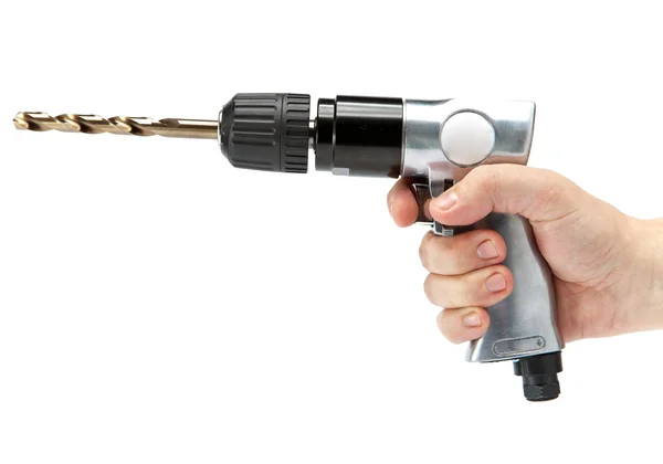 The hand holds reversible air drill — Stock Photo, Image