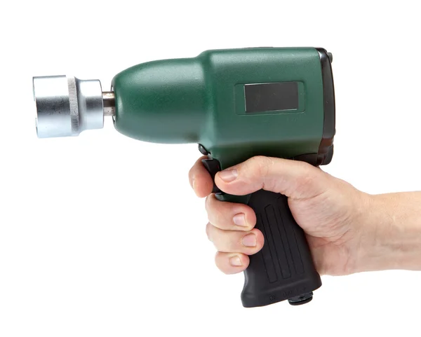 The hand holds air impact wrench — Stock Photo, Image