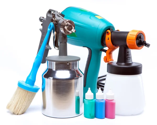 The tool for a painting of surfaces - spray gun electrical and manual mechanical — Stock Photo, Image