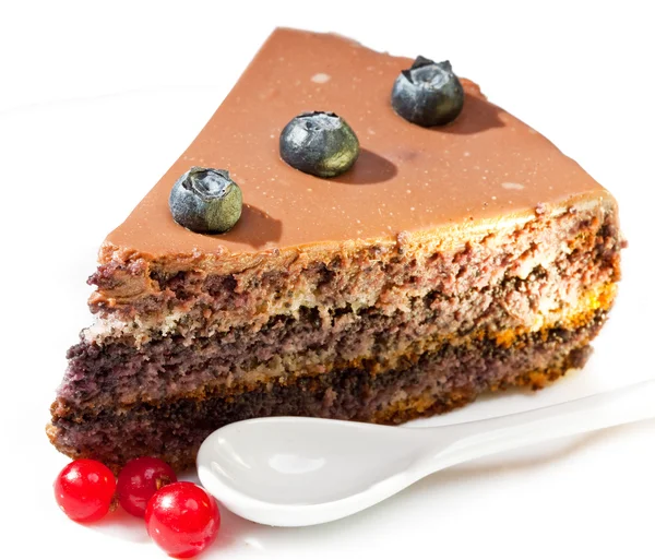 Chocolate Cake with a red currant and a blackberry — Stock Photo, Image