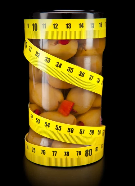 Olive and measuring tape- healthy food — Stock Photo, Image