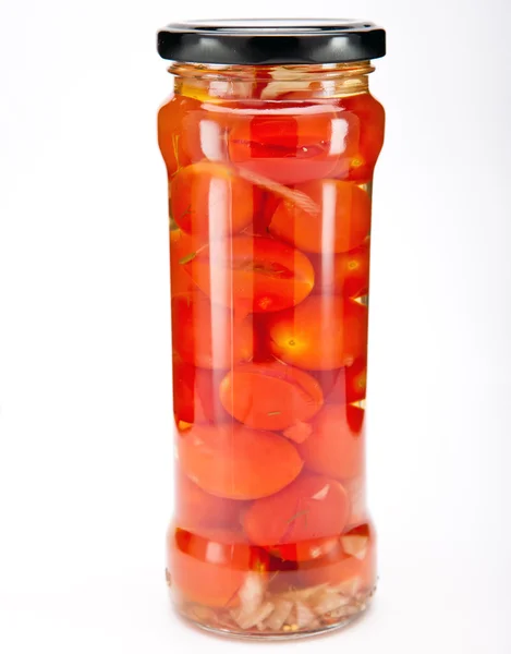 Canned tomatoes in glass jars — Stock Photo, Image