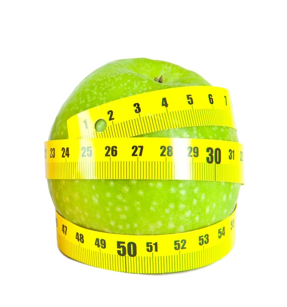 Green apples and measuring tape - healthy food — 图库照片