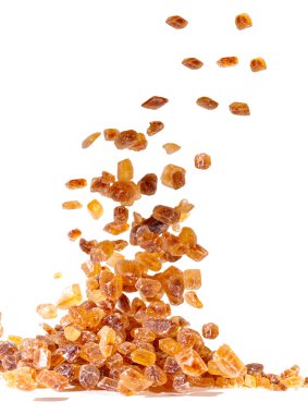 Düşen kahverengi şeker dilimleri