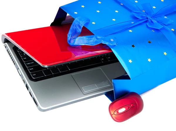 The laptop in a gift package — Stock Photo, Image