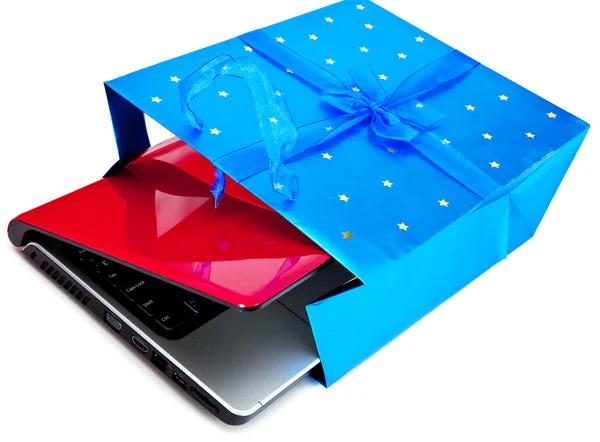 The laptop in a gift package — Stock Photo, Image