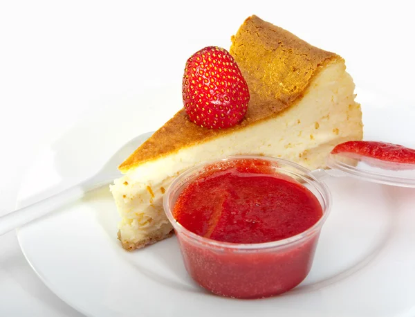 Biscuit with a strawberry and strawberry jam — Stock Photo, Image