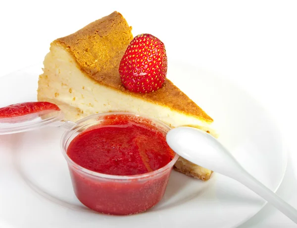 Biscuit with a strawberry and strawberry jam — Stock Photo, Image