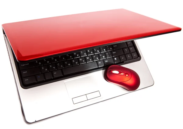 Mouse de computador vermelho e notebook vermelho — Fotografia de Stock