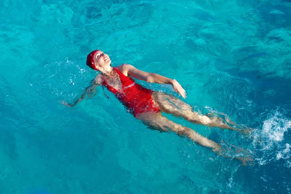 The sports girl swims in the sea — Stock Photo, Image