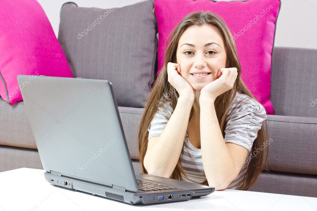 happy student girl using laptop