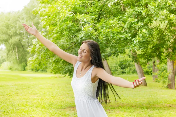 Happiness young woman enjoyment in the nature Stock Image