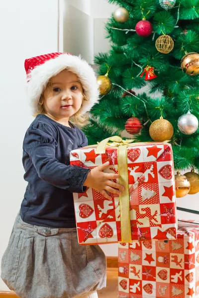 Little Girl Holding a Christmas Gift — Stock Photo, Image