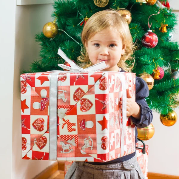 Little Girl Holding a Christmas Gift — Stock Photo, Image