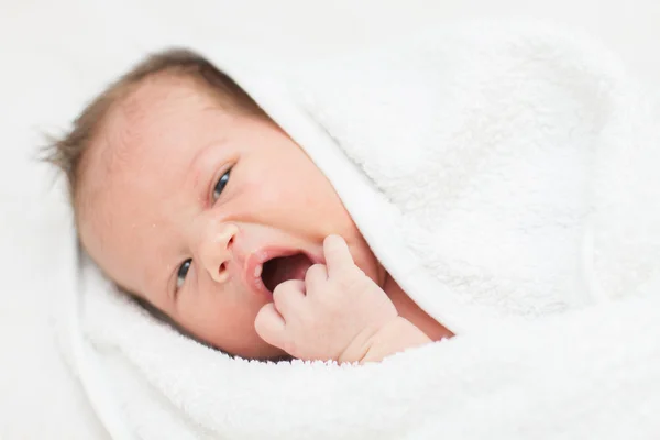 Newborn baby with towel — Stock Photo, Image