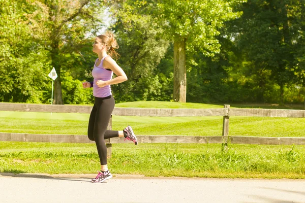 Running vrouw joggen — Stockfoto