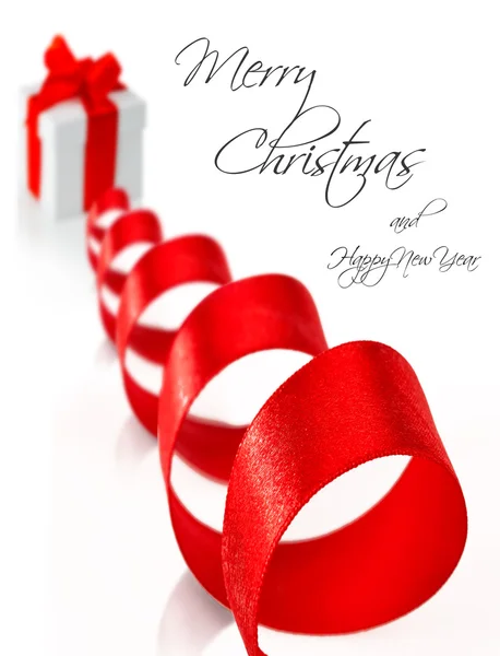 White gift box with red ribbon — Stock Photo, Image