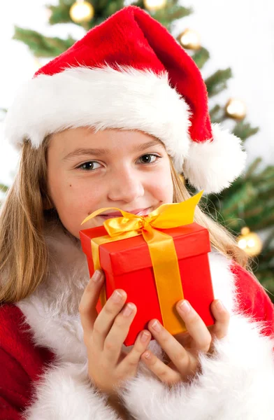 Menina bonita em roupas de Papai Noel — Fotografia de Stock