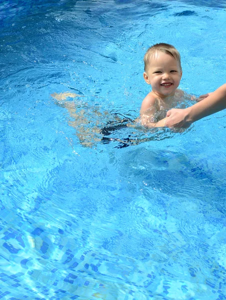 Baby in pool Stock Photo
