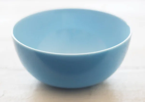 Close Shot New Blue Bowl Wooden Table — стоковое фото