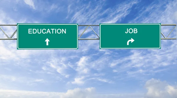 Road sign to education and good job — Stock Photo, Image