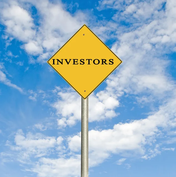 Road sign to investors — Stock Photo, Image