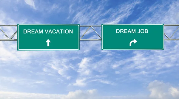 Road sign to dream vacation and dream job — Stock Photo, Image