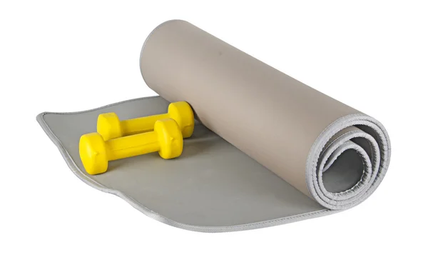 Yoga mat and dumbbells — Stock Photo, Image