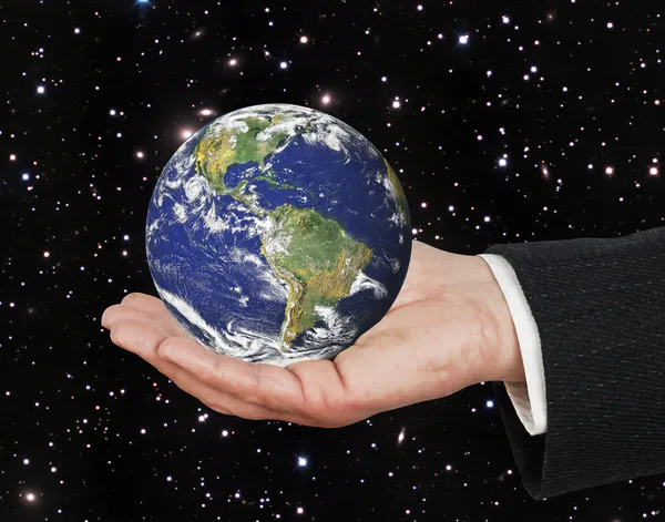 Planet earth on palm.Elements of this image furnished by NASA — Stock Photo, Image