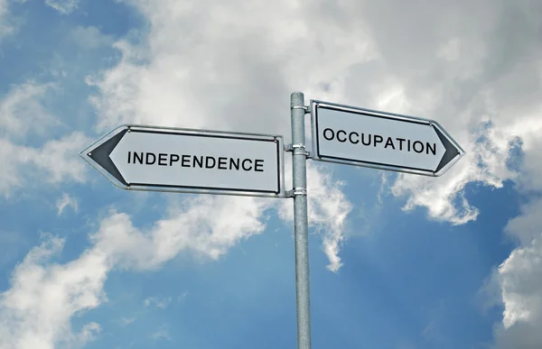 Vägmärke till oberoende och ockupation — Stockfoto