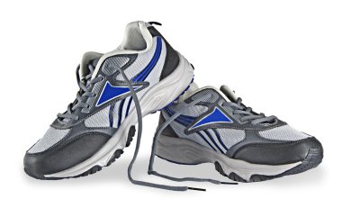 Beyaz arkaplanda izole edilmiş spor ayakkabılar