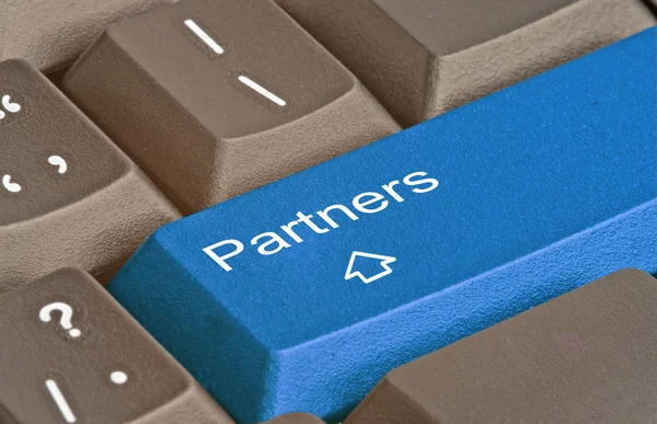 Teclado com chave para parceiros — Fotografia de Stock