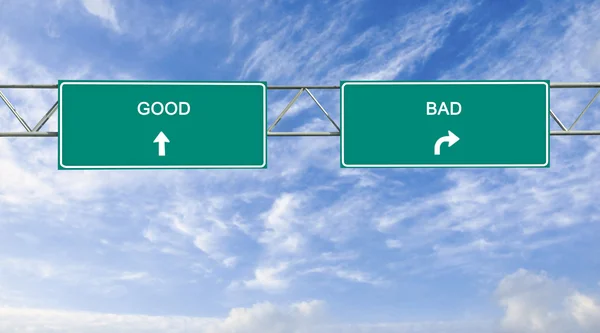 Road signs to good and bad — Stock Photo, Image