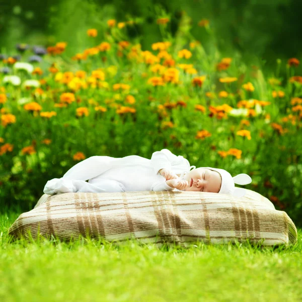 Sweet sleeping baby with rabbit costume — Stock Photo, Image