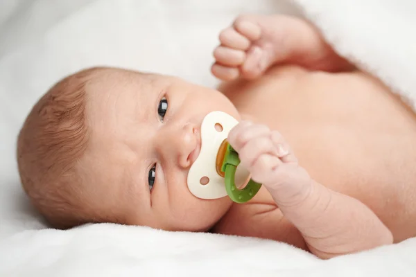 Cute baby with nipple portrait — Stock Photo, Image