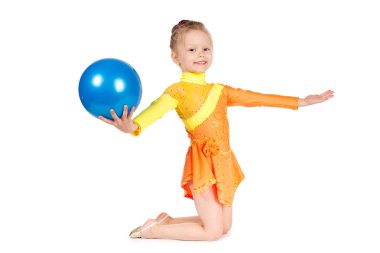 Beautiful girl gymnast with a ball