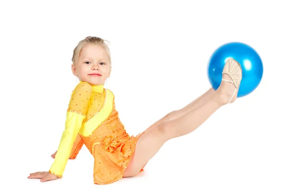 Beautiful girl gymnast with a ball — Stok fotoğraf