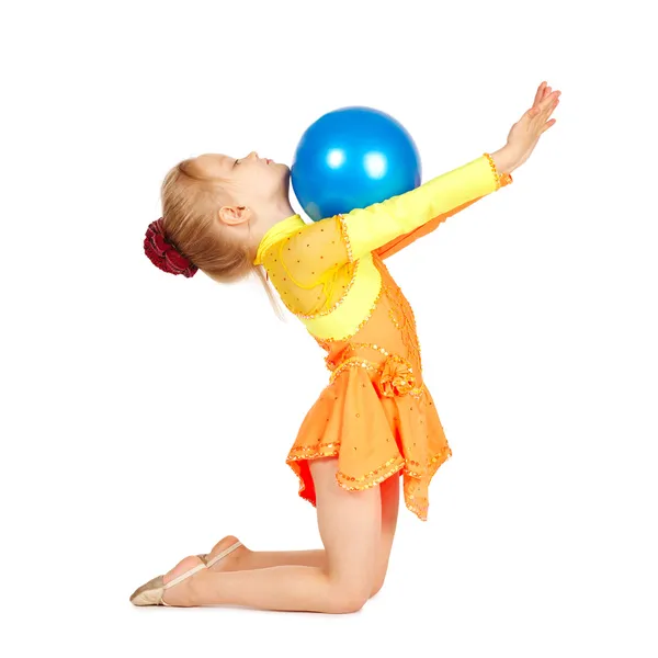 Beautiful girl gymnast with a ball — Stok fotoğraf