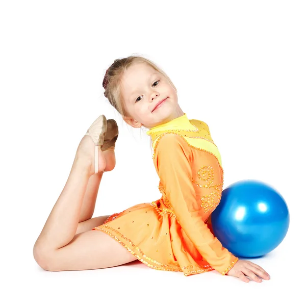 Beautiful girl gymnast with a ball — Stok fotoğraf