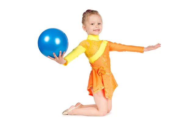 Beautiful girl gymnast with a ball — Stok fotoğraf